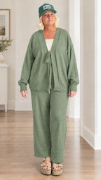 Woman wearing sage green 2-piece cardigan and wide-leg lounge set