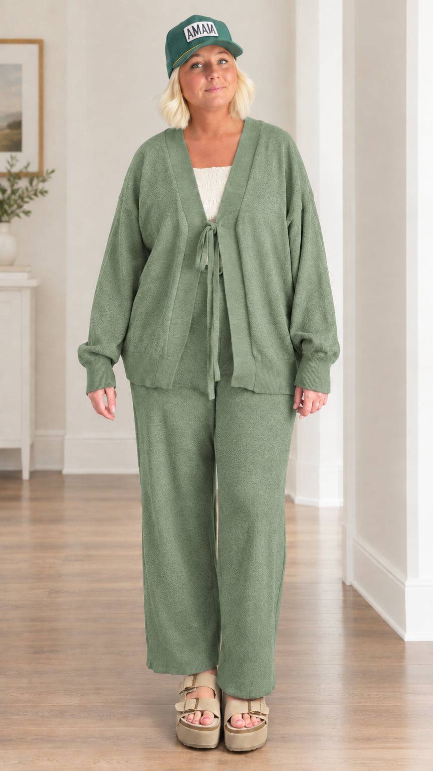 Woman wearing sage green 2-piece cardigan and wide-leg lounge set