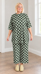 Sage green and white checkered two-piece tunic and wide-leg crop pants set