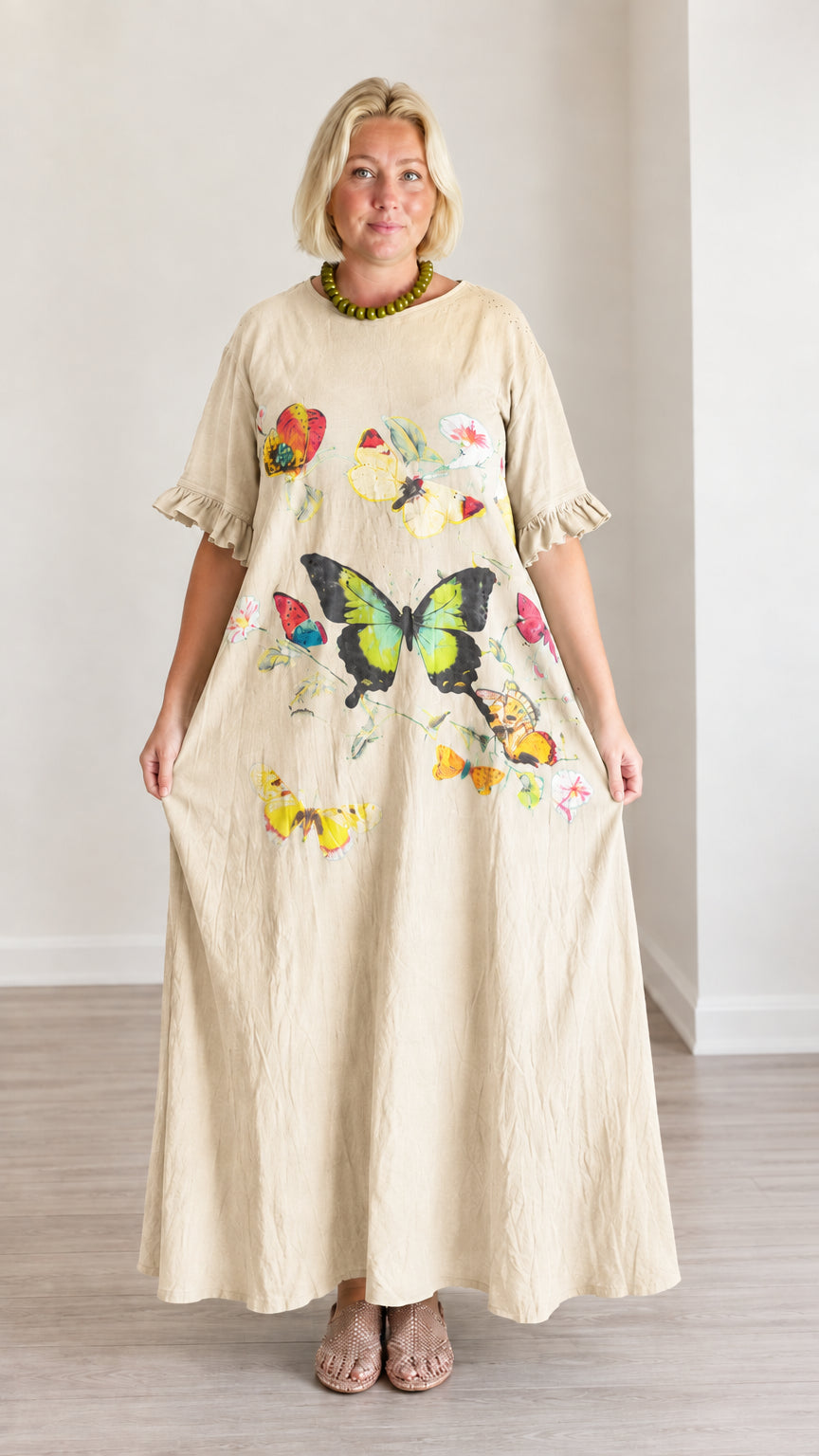 Front view of light beige cream butterfly print casual maxi dress