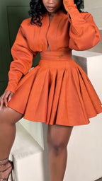 Conjunto elegante de abrigo con cuello en V profundo y falda plisada de cintura alta para mujer